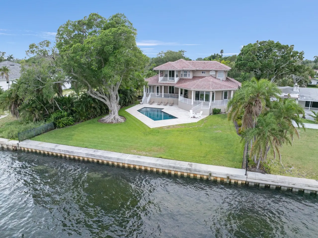 Mediterranean waterfront estate at twilight on Tampa Bay